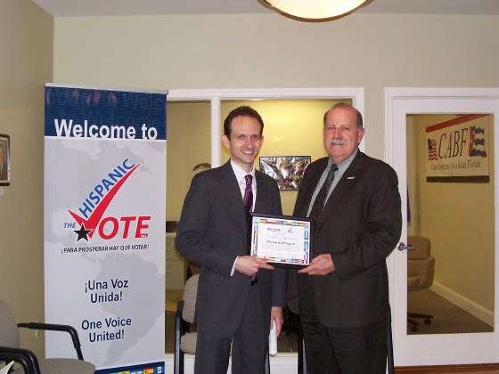 Cuban Americans for a Better Florida Chairperson, Rafael Lopez, presents Certificate of Appreciation to Richard DeNapoli